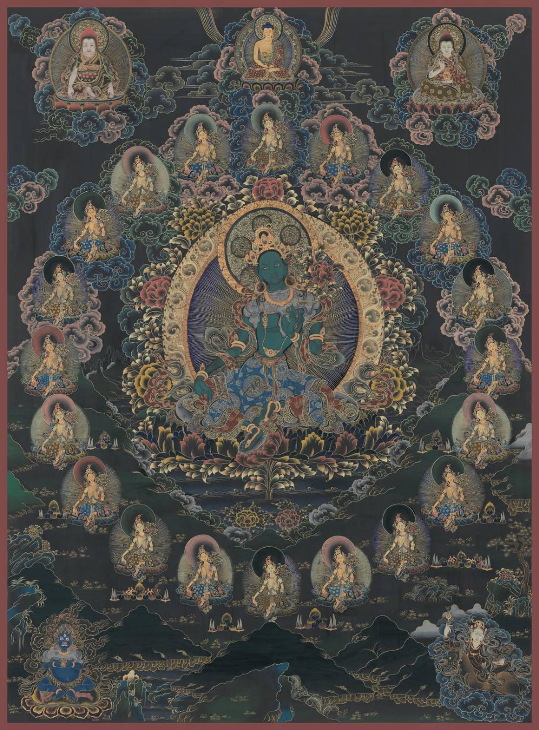 緑多羅菩薩のタンカ：鮮やかな緑色の身体を持ち、右足を前に踏み出して人々を救う姿勢をとっている姿